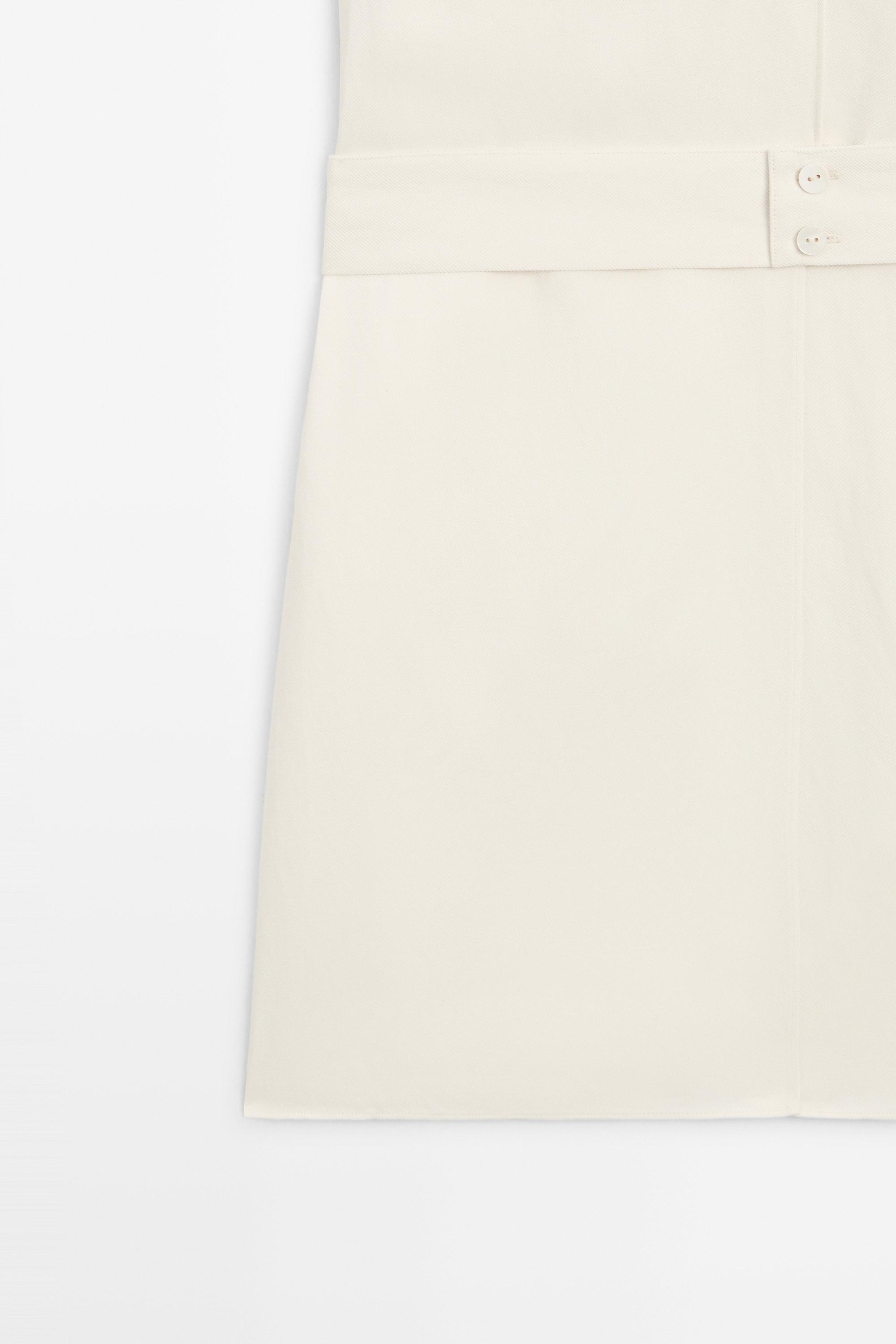 Flowing linen blend vest with belt detail